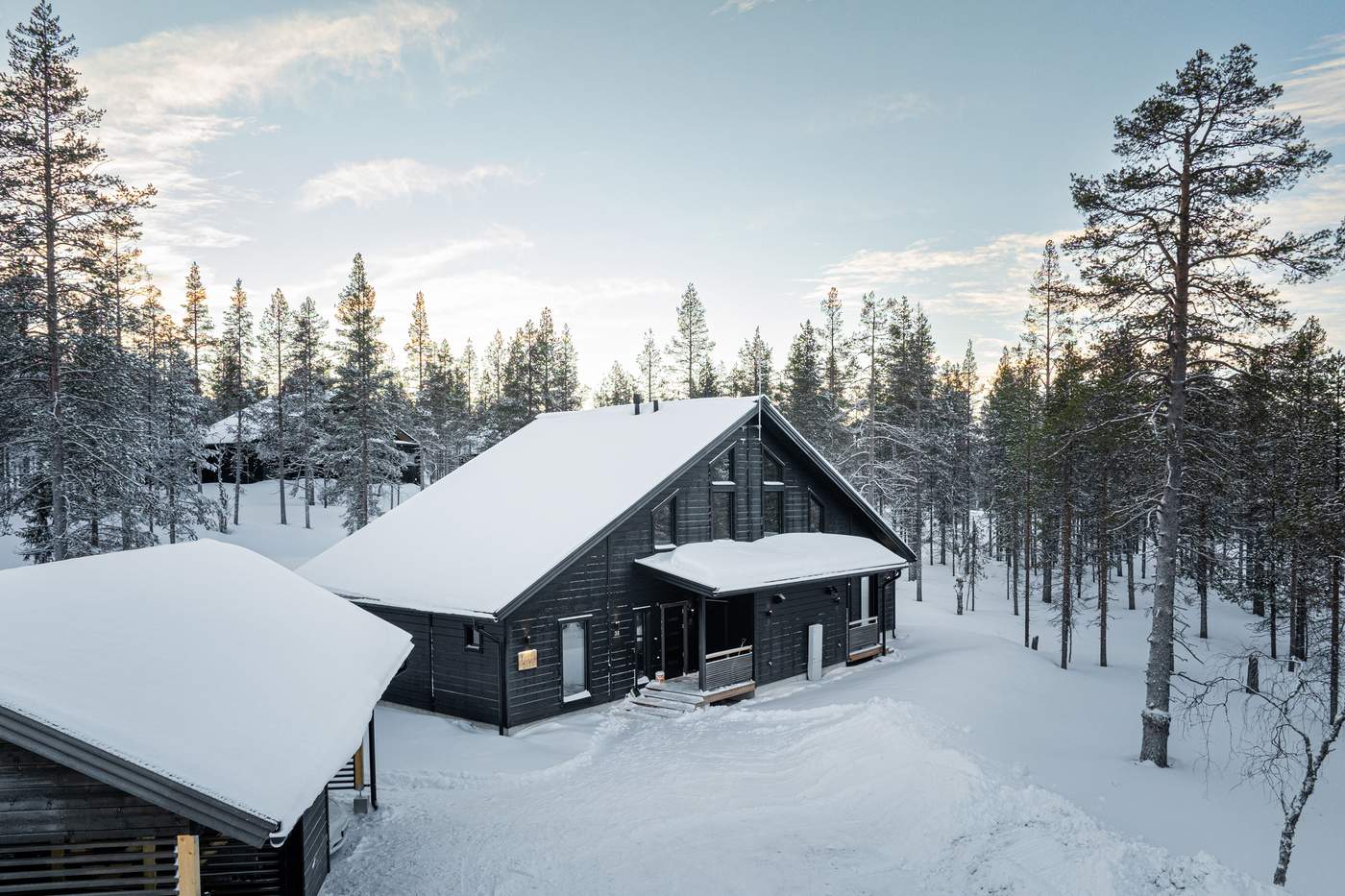 Villa Minna in the snow, surrounded by pine forest