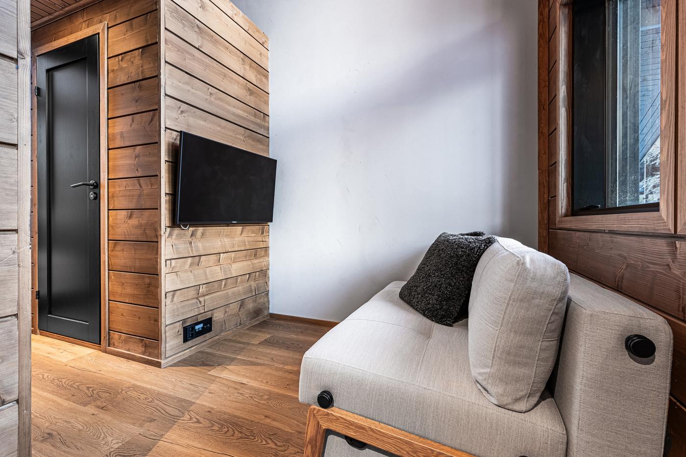 Seating area with sofa and TV