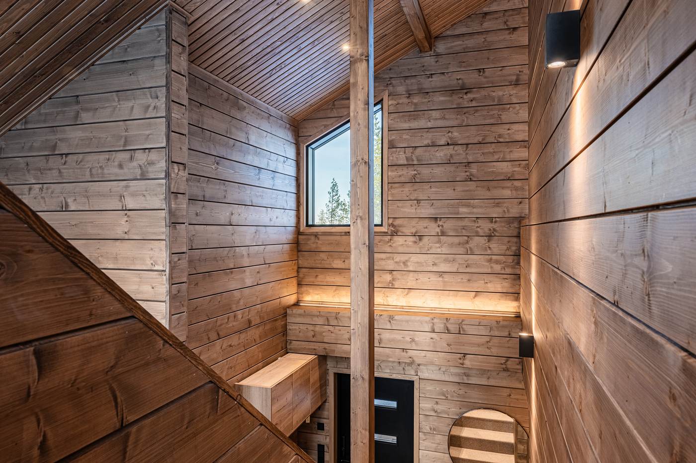 Stairwell with timber walls and lighting