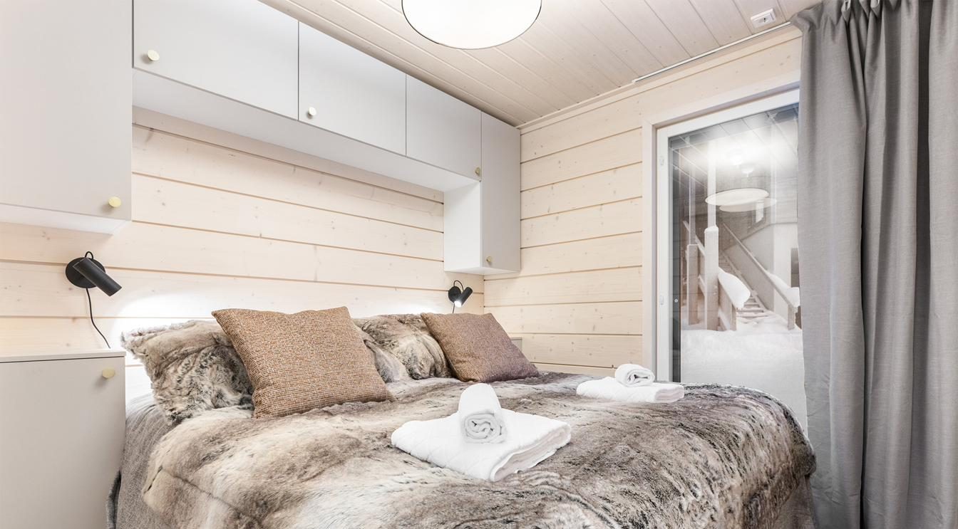 Slaapkamer met uitzicht op het bos